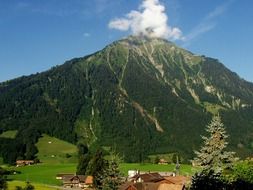 village in valley at niesen mountain at summer, switzerland