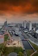 modern city on coast under clouds, germany, bremerhaven