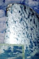 clouds reflection on facade of luxury w hotel, spain, barcelona