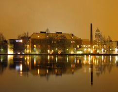 Reflection of Oulu city at night in the water