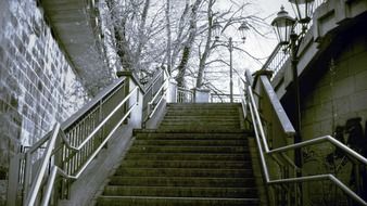 stairway with railing and vintage lanterns outdoor