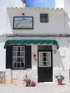 picturesque facade of old white building