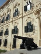 old time cannon at facade of Grandmaster's Palace, malta, valletta