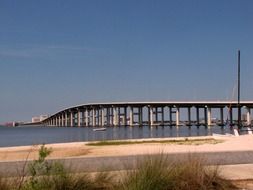 bridge over the ocean on a sunny day