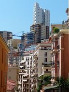 street canyon, old and modern multi-storey buildings in city, monaco