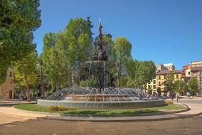 beautiful pomegranate fountain on plaza, spain, granada