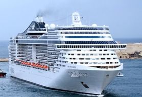 modern cruise ship on water at coast line, malta, valetta