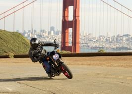 man riding motorcycle at golden gate bridge, usa, california, san francisco