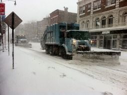 snowplow at work on street, usa, illinois, chicago