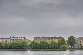 City buildings on river bank