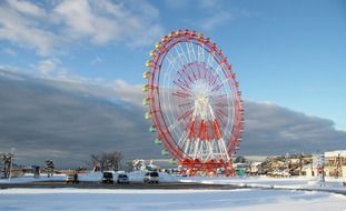 ferris wheel in scenic winter landscape, japan, ouzu