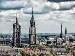 city skyline with gothic bell towers, netherlands, delft