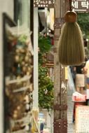 brush hanging on alley, korea, seoul