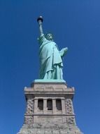 statue of liberty at blue sky, low angle view, usa, new york city