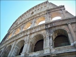 arched windows of ancient colloseum, low angle view, italy, rome