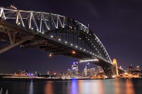 harbor bridge at scenic night cityscape, australia, sydney