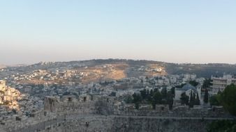 city behind wall at sunrise, israel, jerusalem