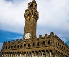 uffizi tower with clock in florence