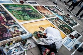 artist painting on street, uk, england, london