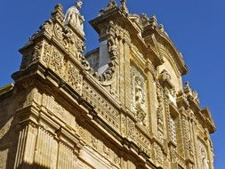 old relief gable facade building blue sky