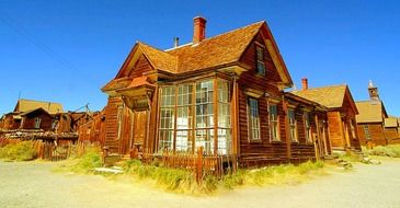 old wooden village buildings on street