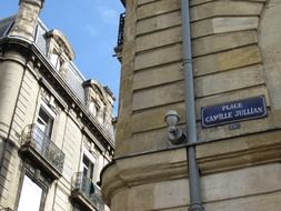 place camille jullian, street name sign on old building in city, france, bordeaux