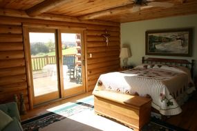 bedroom at log house interior