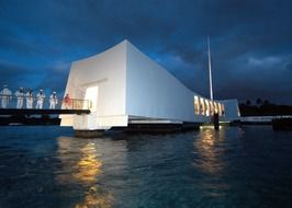 sailors on bridge of USS Arizona Memorial at dusk, usa,hawaii, pearl harbor