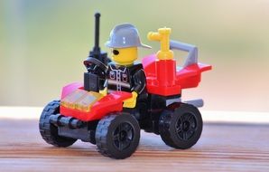 Man driving auto, lego toy