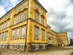 old yellow building with lattice windows, denmark, copenhagen