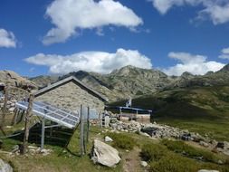 solar panel at hut in rural mountain landscape