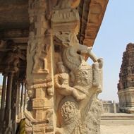 horse rider, ancient stone sculpture on pillar of temple, india, hampi