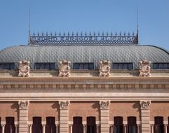 roof of atocha railway station building at sky, spain, madrid