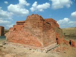 pile of red bricks in countryside, india, dharwad