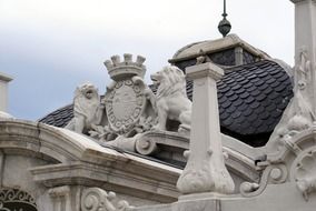 lions with shield, stone sculpture on roof, usa, california, san sebastian