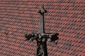 pinnacle of ulm cathedral at tile roof, germany, munich