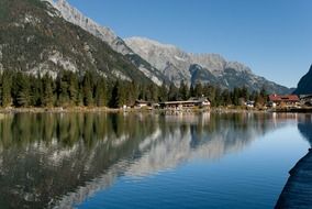 village on shoreline at mountains, austria