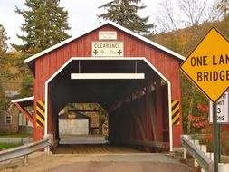 wooden covered bridge in countryside, usa, pennsylvania