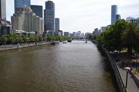 modern buildings on embankment of yarra river, australia, melbourne