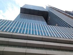 low angle view of high rise office and hotel building, netherlands, rotterdam, wilhelminapier