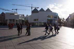 people on plaza at Stadhaus Exhibition & Assembly Building, germany, ulm