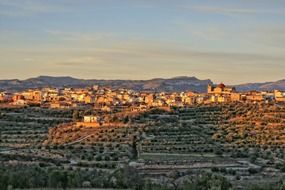 old city in scenic countryside at sunset, spain, el masroig