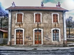 old two-storey building with closed windows and doors, france, ain, collonges