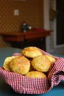 bread in basket on table, home baking