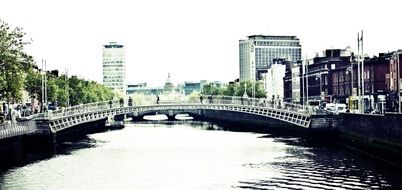 Ha’penny cast iron Bridge in city, ireland, Dublin, Wellington Quay