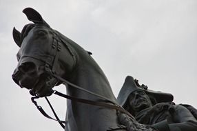 equestrian statue of Frederick the Great, fragment at grey sky, germany, berlin