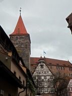 medieval tower and truss building of imperial castle, germany, nuremberg