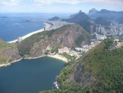 aerial view of modern city on gorgeous rocky coastline, brazil, rio de janeiro