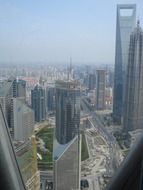 skyscrapers in downtown at fog, china, shanghai