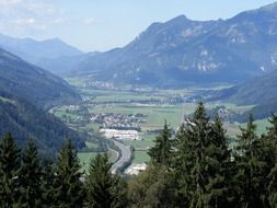 villages at road in beautiful green mountain valley, austria, styria mountains valley